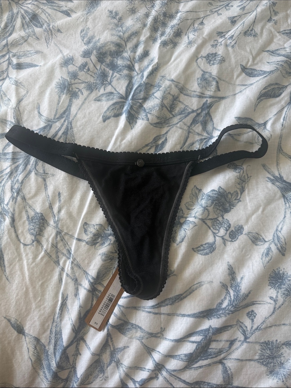 SKIMS Black Lace-Trim Thong with Branded Tag